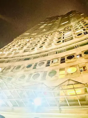 a large white building with lots of windows at Park view apartment klcc with city view in Kuala Lumpur