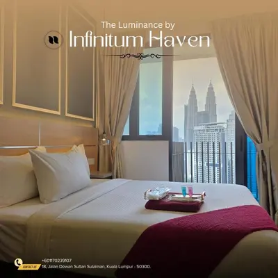 a hotel room with a bed with a view of a city at The Luminance By Infinitum Haven KLCC in Kuala Lumpur
