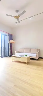 a living room with a bed and a ceiling fan at The Mews KLCC by Luxe Residence in Kuala Lumpur