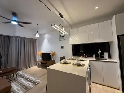 a kitchen and living room with a ceiling fan at Star Residence KLCC By Nexus 72 in Kuala Lumpur