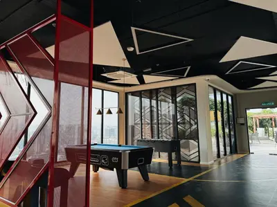 a room with a pool table and a piano at Majestic Suites KLCC by KLIQ in Kuala Lumpur