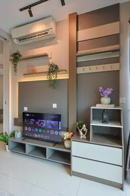 a living room with a flat screen tv on a wall at Elegant Skyline Suite Datum Jelatek near KLCC in Kampong Datok Keramat
