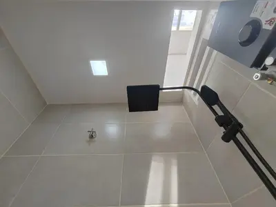 a small spider sitting on the floor of a bathroom at Zen Retreat KL in Kuala Lumpur