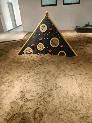 a christmas tree in the middle of a room at Continew Residence by TM House in Kuala Lumpur