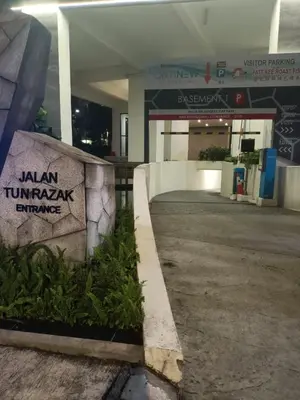 a building with a sign that reads indian turnpak entrance at Continew Residence by TM House in Kuala Lumpur