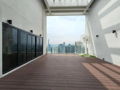 an empty balcony of a building with a view of the city at Agile Residence Bukit Bintang Serviced Suite by LP in Kuala Lumpur