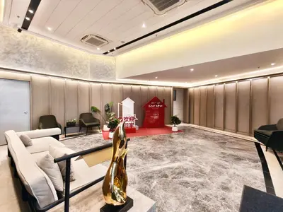 a lobby with a couch and a table and chairs at Agile Residence Bukit Bintang Serviced Suite by LP in Kuala Lumpur