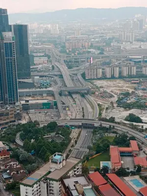 an aerial view of a city with buildings and roads at The Signature Suites at Berjaya Times Square KL in Kuala Lumpur