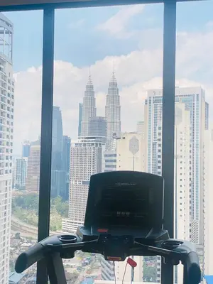 a view of a city skyline from an office window at City centre Majestice Suite KLCC in Kuala Lumpur