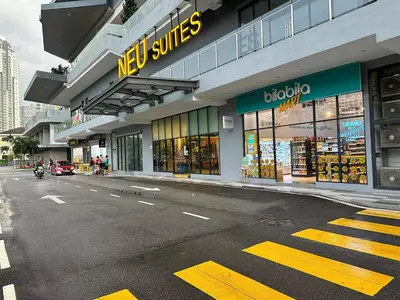 a store on the side of a city street at Cozy, Mini Studio Apartment at Neu Suites by OKBnB in Kuala Lumpur