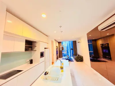 a kitchen with white cabinets and a sink at PLATINUM Suites KLCC at BBS in Kuala Lumpur