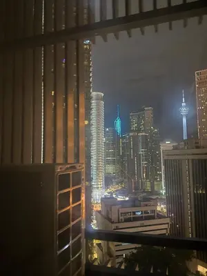 a view of a city skyline at night at KL Star Residance KLCC by Nexus in Kuala Lumpur
