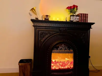 a fireplace in a living room with a fire at Cheras KL Velocity Mall VR3 8pax MRT Maluri NAN JING STREET 焦赖吉隆坡 步行1分钟到 双威伟乐城&南京街 可容8人 in Kuala Lumpur
