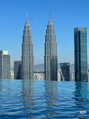 a view of the petronas twin towers from the water at Eaton Hotel \u4f0a\u987f\u9152\u5e97 \u4e94\u661f\u7ea7\u9152\u5e97 in Kuala Lumpur