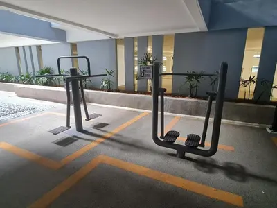 a empty parking lot with a bike rack in a building at Chillax Studio Near KLCC Gleneagles in Kuala Lumpur