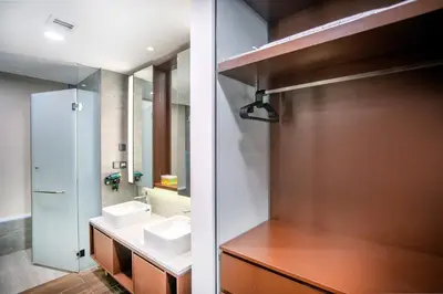 a bathroom with two sinks and a mirror at Novo Ampang Residence Studio Close to KLCC and Gleneagles in Kuala Lumpur