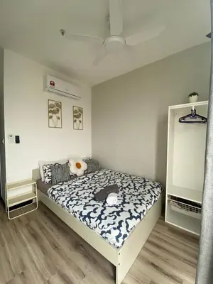 a bedroom with a bed in a room at Comfort Stay Neusuite Jelatek in Kuala Lumpur