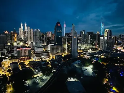 a view of a city at night at Regalia Apartments By FA 6 in Kuala Lumpur