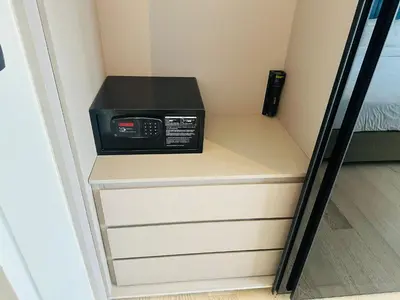 a microwave sitting on top of a shelf in a room at Astra Suites - Star Residence KL in Kuala Lumpur