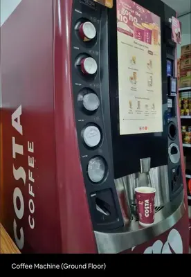 a coffee machine in a store with a cup of coffee at Luxury Affordable at Arte Plus 2BR Near KLCC with WiFi in Kuala Lumpur