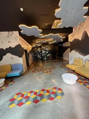 a room with couches and chairs and a ceiling with clouds at Luxury Affordable at Arte Plus 2BR Near KLCC with WiFi in Kuala Lumpur