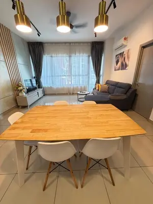 a living room with a wooden table and a couch at Luxury Affordable at Arte Plus 2BR Near KLCC with WiFi in Kuala Lumpur