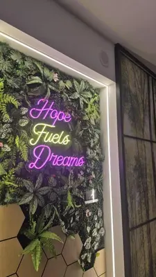 a sign that says hopes fires dreams on a door at Nature Home Agile Bukit Bintang TRX Pavillion Nice View Free Netflix #3 in Kuala Lumpur