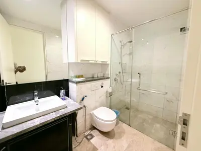 a bathroom with a shower and a toilet and a sink at The Platinum Kuala Lumpur by MAHA in Kuala Lumpur