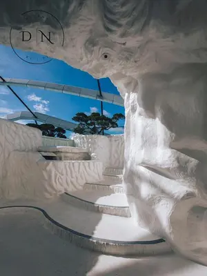 a white sculpture of a mountain with stairs in a skate park at ARTE Mont Kiara Modern Sanctuary Jacuzzi in Kuala Lumpur