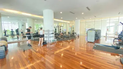 a couple of people standing in a gym at 3-10mins to klcc -pavilion -premium studio 2-4pax in Kuala Lumpur
