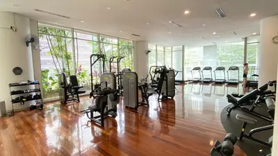 a gym with several treadmills and exercise bikes at 3-10mins to klcc -pavilion -premium studio 2-4pax in Kuala Lumpur