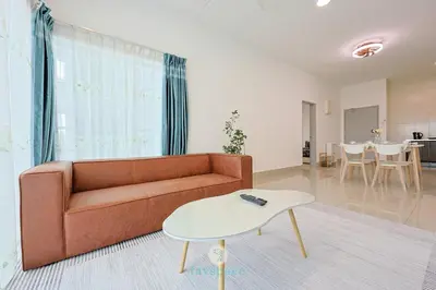 a living room with a couch and a table at Chan Sow Lin - Cozy 3B3B - 6 pax - F&B & Mart in Kuala Lumpur
