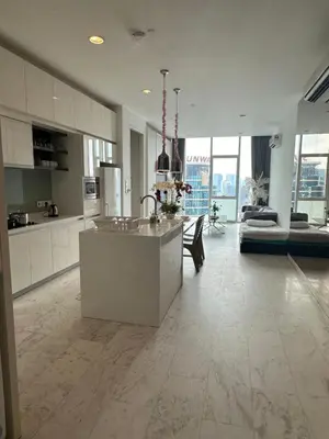 a kitchen with a island in the middle of a room at Global Suites at Platinum kLCC in Kuala Lumpur