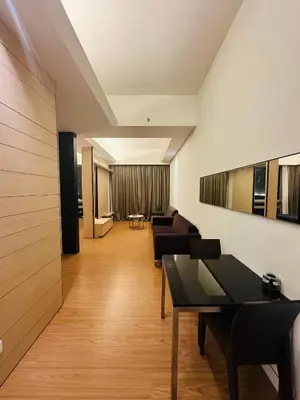 a living room with a couch and a table at Swiss Garden Resident By FA in Kuala Lumpur