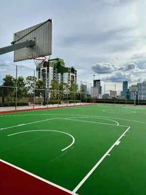 an empty basketball court with a basketball hoop at KL Sentral 16th Floor KL City View in Kuala Lumpur