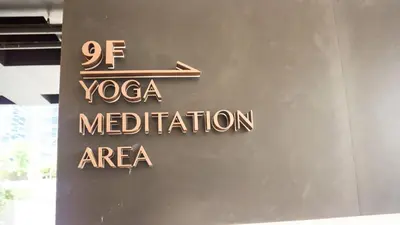 a sign for a meditation area on a building at Manor Residences KLCC in Kuala Lumpur