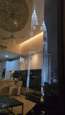 a view of the empire state building at night at Urban Starscape 50450, KL in Kuala Lumpur