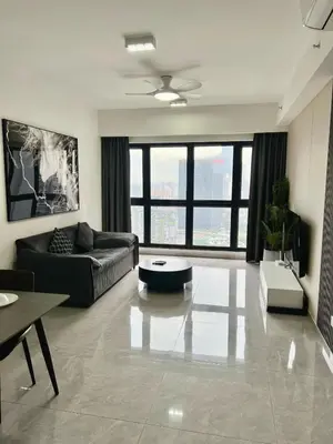 a living room with a couch and a table at Residence Agile Apartment at kulalampur in Kuala Lumpur