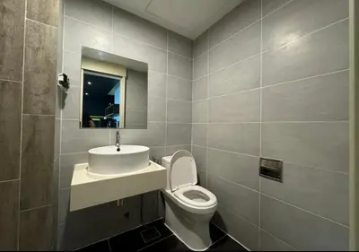 a bathroom with a toilet and a sink at Affordable at Arte Plus near KLCC with WiFi and Parking in Kuala Lumpur