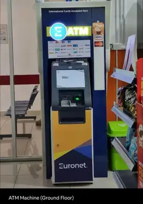 an atm machine in a store next to a shelf at Affordable at Arte Plus near KLCC with WiFi and Parking in Kuala Lumpur