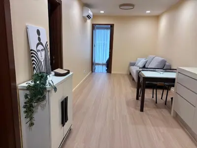 a living room with a couch and a table at Prime location in Bukit Bintang, Studio for 2 in Kuala Lumpur