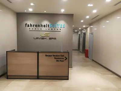 a lobby of a building with a sign on the wall at Fahrenheit88 Suites Bukit Bintang A 2R in Kuala Lumpur