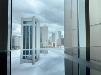 a view of a city skyline from a building at PLATINUM SUITES KLCC By CHENLUN in Kuala Lumpur