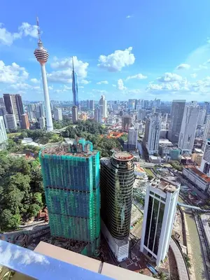 a view of a large city with tall buildings at Platinum Suites in Kualalumpur City Center in Kuala Lumpur