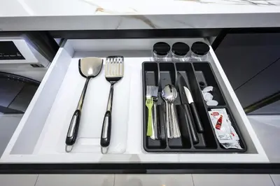 a tray with utensils on top of a counter at Majestic Residence KLCC Royal Premium King Bed in Kuala Lumpur