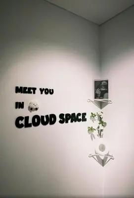 a wall with a sign that reads meet you in cloud space at CherasCochrane walkto MRT Near TRX, KLCC, pavilion in Kuala Lumpur
