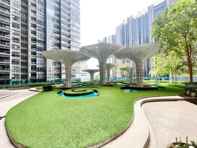 a park with a grassy area with buildings at Arte Plus Ampang Free Parking By Paradgm Stay in Batu Empat