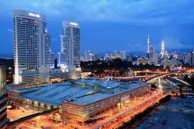 a view of a city at night with buildings at High-Floor Suasana KL Stay Cozy & Central in Kuala Lumpur