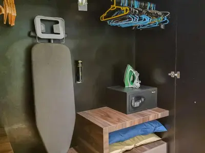 a bathroom with a urinal and a box on a wall at KL City Designer Studio in D Majestic near LRT and Lalaport CityNest in Kuala Lumpur