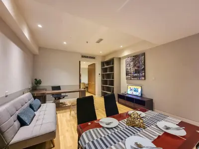 a living room with a couch and a table at KL City Designer Studio in D Majestic near LRT and Lalaport CityNest in Kuala Lumpur